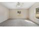 Cozy bedroom with carpet, natural light, and neutral color palette, offering a serene space at 261 Lakeview Dr, Locust Grove, GA 30248