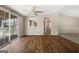 Open dining area with modern flooring, a ceiling fan, and glass sliding doors leading to outdoor space at 261 Lakeview Dr, Locust Grove, GA 30248