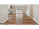 Open dining area connecting the kitchen, features stylish flooring and a sliding glass door to the backyard at 261 Lakeview Dr, Locust Grove, GA 30248
