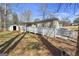 Exterior view of a home with a ramp leading to the front porch at 261 Lakeview Dr, Locust Grove, GA 30248