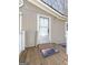 Welcoming front entrance with ramp and a cozy 'Welcome To Our Home' mat at 261 Lakeview Dr, Locust Grove, GA 30248