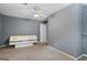 Neutrally painted room with a ceiling fan, suitable for bedroom or flexible living space at 227 River Trace Ct, Mcdonough, GA 30253