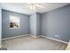 Clean and simple bedroom with neutral walls and a window providing natural light at 227 River Trace Ct, Mcdonough, GA 30253