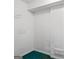 A minimalist closet space featuring basic shelving and a simple design at 227 River Trace Ct, Mcdonough, GA 30253