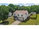 A well-kept, two-story home with an attached garage and a private backyard featuring a pool at 227 River Trace Ct, Mcdonough, GA 30253
