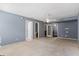 Expansive living area with ample lighting and neutral walls ready for personal touches at 227 River Trace Ct, Mcdonough, GA 30253