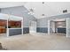 Bright living room showcasing open layout and easy access to adjacent kitchen and dining spaces at 227 River Trace Ct, Mcdonough, GA 30253