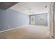 Spacious living room with a ceiling fan, offering a blank canvas for customization at 227 River Trace Ct, Mcdonough, GA 30253