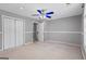 Bedroom with plush carpet, gray walls, and white trim, offering a serene atmosphere at 227 River Trace Ct, Mcdonough, GA 30253