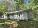 Ranch style home featuring a manicured lawn and classic curb appeal at 324 Bells Ferry Ne Rd, White, GA 30184