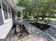 View of the home featuring a tidy yard with fresh mulch, gravel, and walkway to porch at 324 Bells Ferry Ne Rd, White, GA 30184