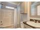 Bathroom featuring a shower/tub combo and vanity at 36 Highpoint Ln, Locust Grove, GA 30248