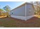 Home with gray siding featuring outdoor deck, modern windows and landscaping at 36 Highpoint Ln, Locust Grove, GA 30248
