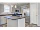 Modern kitchen with stainless steel appliances and an island at 36 Highpoint Ln, Locust Grove, GA 30248