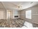 Bright living room with decorative fireplace and modern flooring at 36 Highpoint Ln, Locust Grove, GA 30248