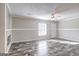 Sunlit living room with modern flooring and a welcoming atmosphere at 36 Highpoint Ln, Locust Grove, GA 30248