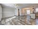 Spacious living room with modern flooring and plenty of natural light at 36 Highpoint Ln, Locust Grove, GA 30248