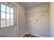 Mudroom featuring a door to the outside and a storage rack at 36 Highpoint Ln, Locust Grove, GA 30248