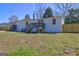The home's backyard offers a fenced yard and a small deck at 152 Skyland E Dr, Locust Grove, GA 30248