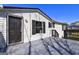 The exterior of the home showcases black shutters and a gray deck at 152 Skyland E Dr, Locust Grove, GA 30248
