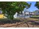 Exterior of home featuring a large deck and well-maintained yard at 152 Skyland E Dr, Locust Grove, GA 30248