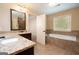 Bathroom with double vanity, bathtub, and shower at 166 Nobility Ln, Mcdonough, GA 30252
