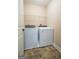 Bright laundry room with washer and dryer at 166 Nobility Ln, Mcdonough, GA 30252