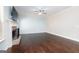 Bright living room featuring a fireplace and large windows for ample natural light at 166 Nobility Ln, Mcdonough, GA 30252