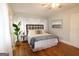 Comfortable bedroom with hardwood floors, soft natural light, and stylish furnishings at 997 Boulevard Se, Atlanta, GA 30312