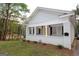 Charming single-story home with a welcoming front porch and well-maintained landscaping at 997 Boulevard Se, Atlanta, GA 30312