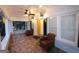 Inviting front porch featuring tile flooring, comfortable seating, and ample natural light at 997 Boulevard Se, Atlanta, GA 30312