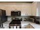Well-equipped kitchen featuring stainless steel appliances and ample counter space at 997 Boulevard Se, Atlanta, GA 30312