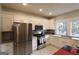 Modern kitchen with stainless steel appliances, white cabinets, and granite countertops at 997 Boulevard Se, Atlanta, GA 30312