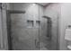 Modern shower features decorative tile, glass surround, and dual shower heads at 997 Boulevard Se, Atlanta, GA 30312