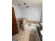 Bathroom featuring a jacuzzi tub and granite countertop at 2889 Carrousel Ct, Stone Mountain, GA 30087