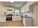 Bright kitchen features stainless steel appliances, granite countertops, and ample cabinet space at 7279 Mayfair Cir, Jonesboro, GA 30236