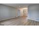 The living room boasts modern flooring and a chandelier at 7279 Mayfair Cir, Jonesboro, GA 30236