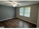 Bedroom with hardwood floors and two windows providing natural light at 2691 Old South Dr, Jonesboro, GA 30236