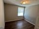 Comfortable bedroom with hardwood floors and window offering plenty of natural light at 2691 Old South Dr, Jonesboro, GA 30236