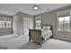 Comfortable bedroom with carpet, complemented by natural light from several windows at 400 Conservatory Pt, Fayetteville, GA 30215