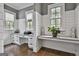 Bright home office space with shiplap walls and multiple windows for natural light at 400 Conservatory Pt, Fayetteville, GA 30215