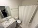 This bathroom offers a single sink, a large mirror, and a shower/tub combination at 142 Hampton Cir, Mcdonough, GA 30253