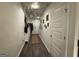 Unique hallway decorated with portraits and interesting fixtures and decor at 142 Hampton Cir, Mcdonough, GA 30253