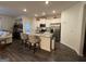 Bright kitchen featuring granite countertops, stainless steel appliances, and white cabinets at 142 Hampton Cir, Mcdonough, GA 30253