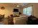 Comfortable living room featuring a fireplace and large window at 142 Hampton Cir, Mcdonough, GA 30253