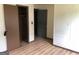 Bedroom closet interior with an opening into another room at 6186 Green Acres Sw Dr, Covington, GA 30014