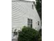 Exterior of the home, featuring siding and windows at 1047 Plantation Nw Way, Kennesaw, GA 30144