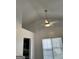 Living room with fan and window with blinds at 1047 Plantation Nw Way, Kennesaw, GA 30144