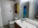 Bathroom with double sink vanity and tiled floors at 625 Locust Rd, Locust Grove, GA 30248