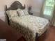 Bedroom with hardwood floors, bed, a flower vase and a window at 625 Locust Rd, Locust Grove, GA 30248